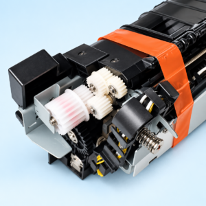Close-up view of drive gears and high-torque mechanism on Canon IR 2520 Fuser Unit